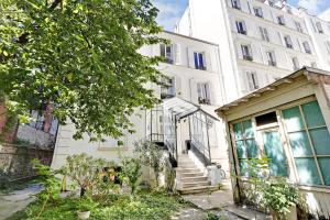 Vonkajšia záhrada v ubytovaní Charming apartment - 1BR-4P - Parc Monceau