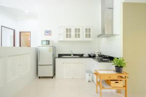 A cozinha ou cozinha compacta de BK Villa