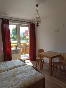 Postel nebo postele na pokoji v ubytování Dom Dobre Miejsce