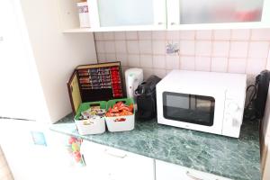 A kitchen or kitchenette at La casa di Valentino - grazioso ed ampio bilocale