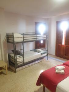 Posteľ alebo postele v izbe v ubytovaní 1D Apartamento con vistas a la Alhambra