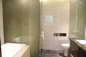 Koupelna v ubytování Ramada Foshan Hotel