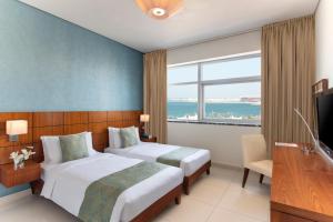 Μια τηλεόραση ή/και κέντρο ψυχαγωγίας στο Fraser Suites Doha