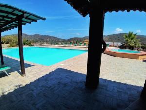 The swimming pool at or close to Al Barcoco