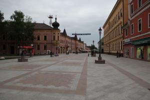 an empty street in a city with buildings at Apartments with WiFi Vinkovci, Slavonija - 16805 in Vinkovci