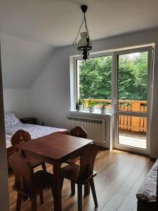 Postel nebo postele na pokoji v ubytování Dom Dobre Miejsce