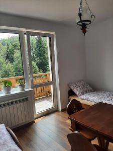 Postel nebo postele na pokoji v ubytování Dom Dobre Miejsce