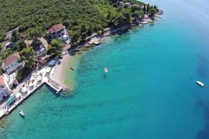 an aerial view of a beach with boats in the water at Apartments by the sea Loviste, Peljesac - 15150 in Lovište +6 photos
