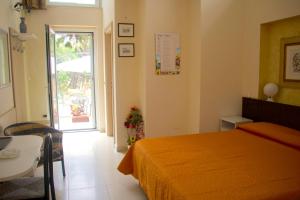 Postel nebo postele na pokoji v ubytování b&b il villino
