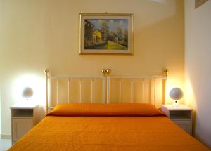 Postel nebo postele na pokoji v ubytování b&b il villino