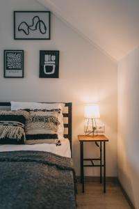 Postel nebo postele na pokoji v ubytování Kardamom Studio Apartman