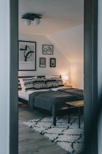 Postel nebo postele na pokoji v ubytování Kardamom Studio Apartman