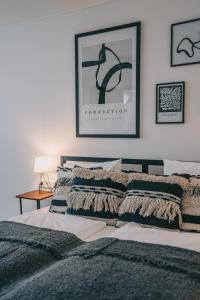 Postel nebo postele na pokoji v ubytování Kardamom Studio Apartman