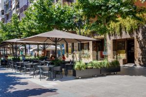 Restaurant ou autre lieu de restauration dans l'établissement IBIZA ROOMs