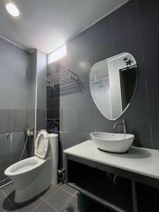 Koupelna v ubytování Metroinn Hotel