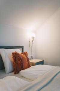 Postel nebo postele na pokoji v ubytování Kardamom Studio Apartman