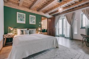 Postel nebo postele na pokoji v ubytování Kardamom Studio Apartman + 37 fotografií