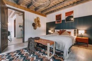 Postel nebo postele na pokoji v ubytování Kardamom Studio Apartman