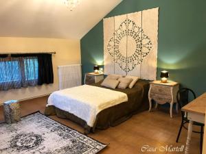 Postel nebo postele na pokoji v ubytování Hospedería Casa Martell