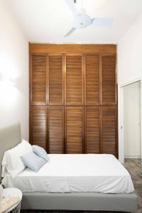 Ένα ή περισσότερα κρεβάτια σε δωμάτιο στο I due Balconcini By Dimorra