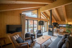 TV a/nebo společenská místnost v ubytování Chalet One Jasná