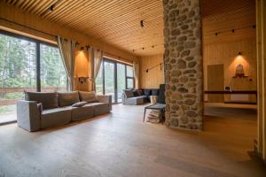 Posezení v ubytování Chalet One Jasná