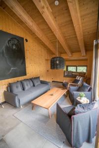 Posezení v ubytování Chalet One Jasná