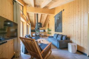 Posezení v ubytování Chalet One Jasná