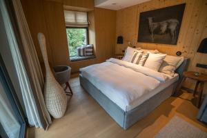 Postel nebo postele na pokoji v ubytování Chalet One Jasná