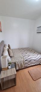 Postel nebo postele na pokoji v ubytování Yuna Homestay - Furnished Home in Butuan