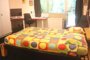 Postel nebo postele na pokoji v ubytování B&B Middelheim