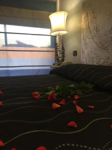 Un pat sau paturi într-o cameră la Hotel Feel Inn Venice Airport Rooms