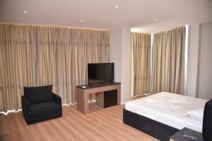 TV a/nebo společenská místnost v ubytování Hotel Continental