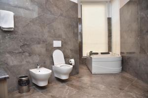 Koupelna v ubytování Hotel Continental