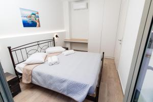 Posteľ alebo postele v izbe v ubytovaní Seaside apartment