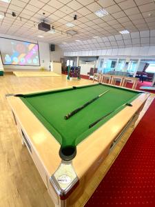 a pool table in a bowling alley at Croyde Bay Hotel or Self Catering in Croyde