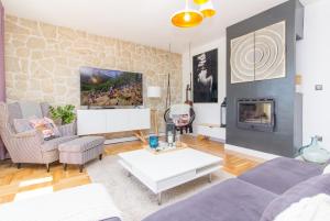 Posezení v ubytování Apartments Mali Dvor Novigrad
