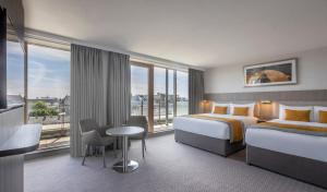 Cama ou camas em um quarto em Maldron Hotel Smithfield Dublin City