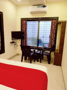 Hotel Adinath TV 또는 엔터테인먼트 센터