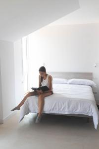 Hostel Villa Miguela客房内的一张或多张床位
