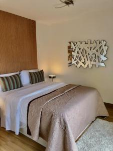 A bed or beds in a room at MIRADOR DE MERESE