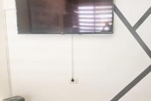A television and/or entertainment centre at MIRADOR DE MERESE