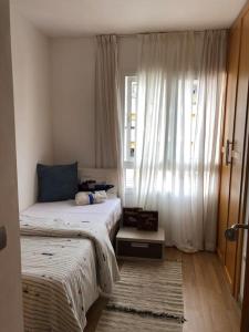 A bed or beds in a room at MIRADOR DE MERESE