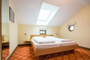 Postel nebo postele na pokoji v ubytování Bahnhof Busch