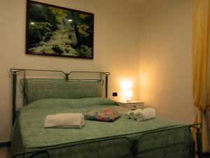 En eller flere senge i et værelse på Casale degli Angeli Ostuni