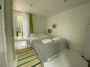 Posteľ alebo postele v izbe v ubytovaní Maasikmäe- unustamatu puhkus looduse vaikuses