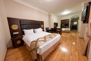Кровать или кровати в номере Era Palace Hotel