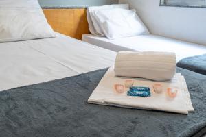 Postel nebo postele na pokoji v ubytování Hotel Vital, Rio de Janeiro