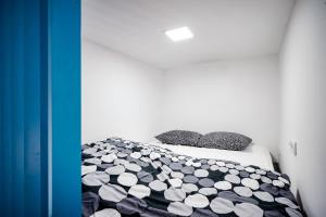 Posteľ alebo postele v izbe v ubytovaní Twin Apartment