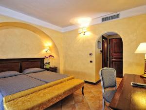 Кровать или кровати в номере Hotel Arbatasar